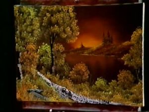 A black canvas painting by Bob Ross